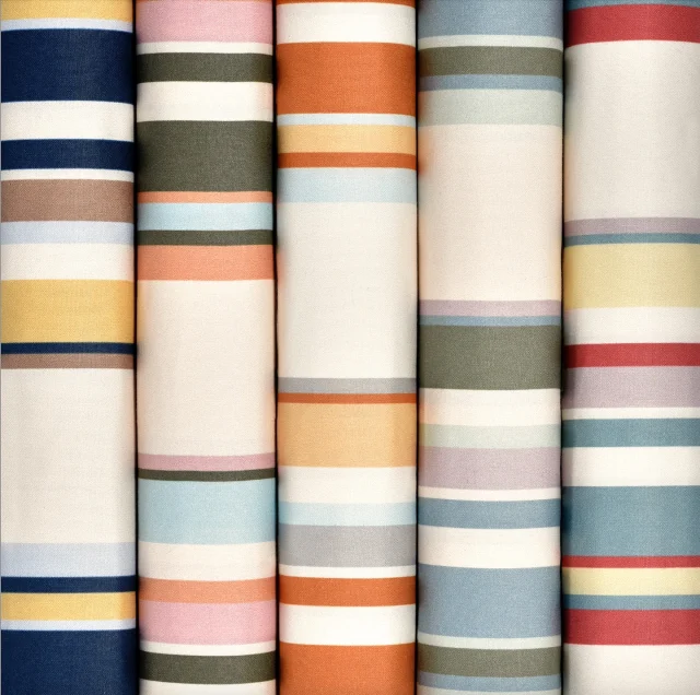 M A R N I  a striking five-colour stripe I truly adore. Bold yet beautifully balanced, it brings a fresh, contemporary edge to traditional florals or chintz. We think it’s a timeless way to elevate your interior.

Available in five colourways — Provence (Blue/Green/Purple), Capri (Blue/Red/Yellow), Tangier (Yellow/Orange/Blue), Athens (Brown/Navy/Yellow) and Tuscany (Orange/Blue/Yellow).